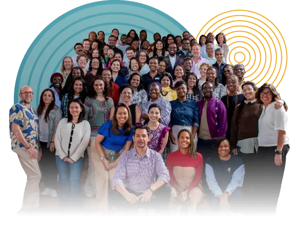 Large and diverse group of people posing together for a group photo – Co-Impact website