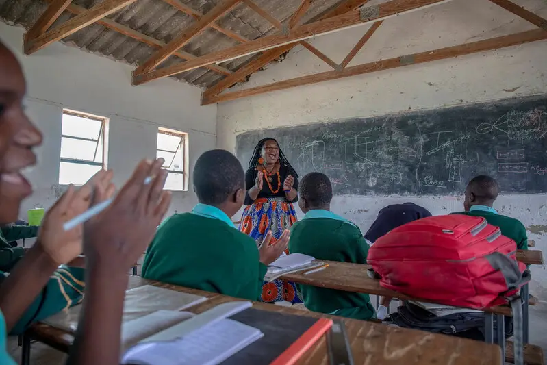 Angeline Murimirwa visits a classroom in Chikomba, Zimbabwe. Photo by Cynthia R. Matonhodze, February 2019.