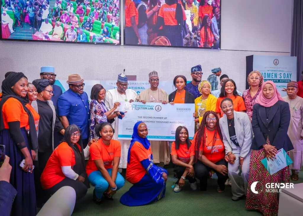 Group of participants at an event recognizing social initiatives and collaboration – Co-Impact website